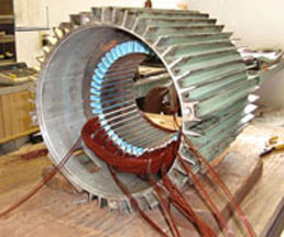 Photo of interior of electric motor rewind in-process